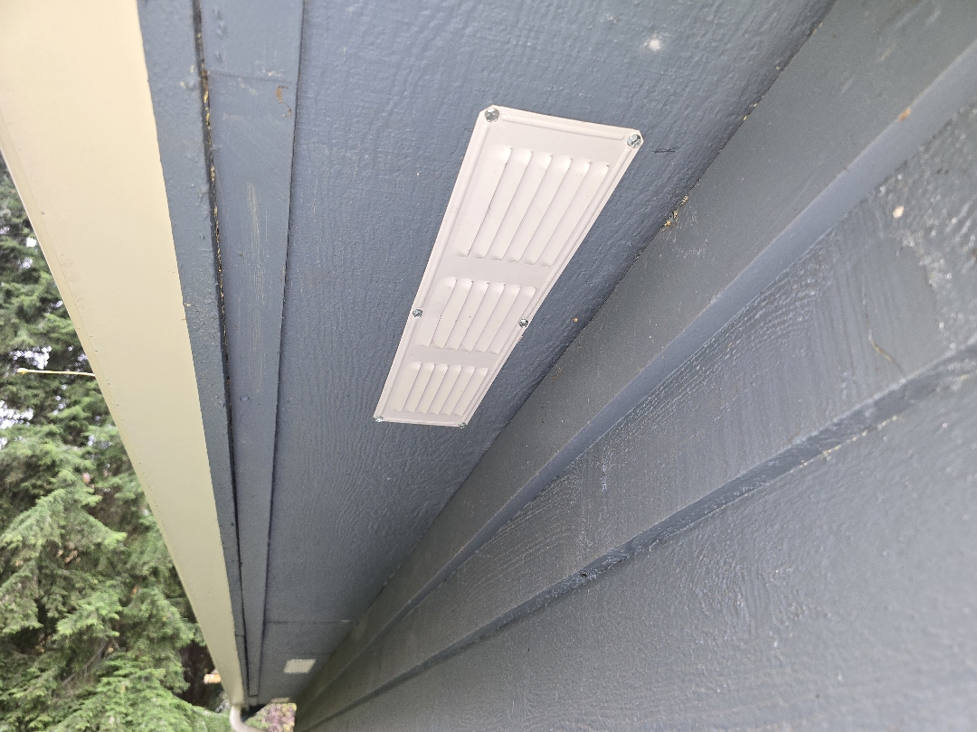 Soffit Vent Installed to Improve Attic Intake Ventilation