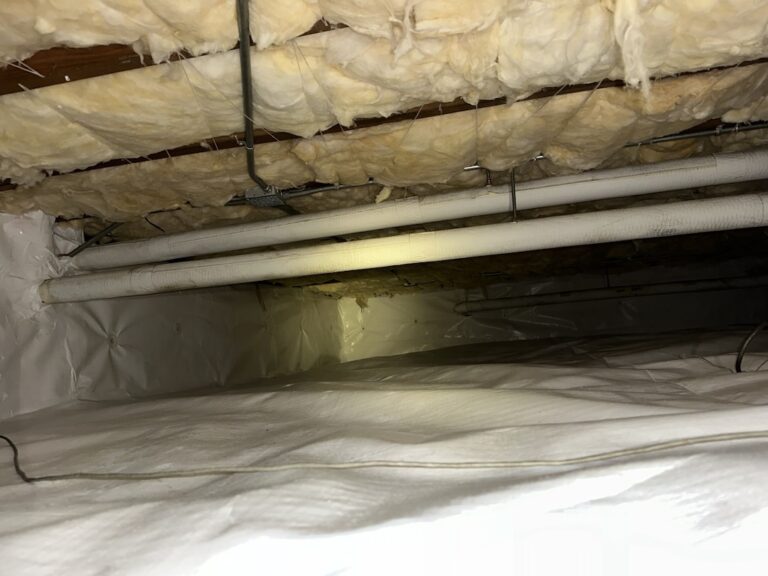 After Crawl Space Restoration - New Vapor Barrier And Insulation